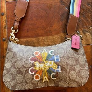 Nolita 19 Coach canvas pride handbag with detachable rainbow strap!